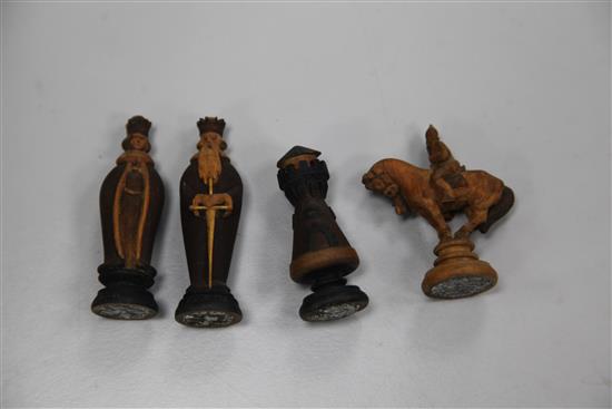 An unusual 19th century Russian figural carved wood chess set,